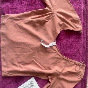 Size 8 Lululemon Align Long Sleeve crop New With Tags color is light Blush pink